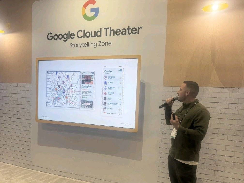 Chris presenting on the Google Cloud Theater stage at NRF '25, beside a screen showing a map-based experience