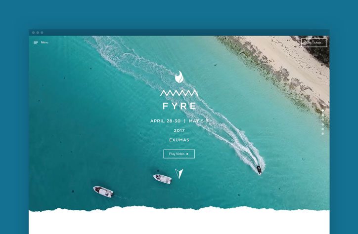 The homepage over an aerial shot of boats in turquoise water
